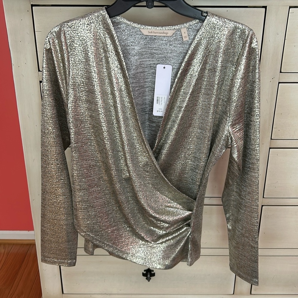 Ruched side with long sleeves. Metallic has both gold & silver sheen.